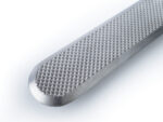Tactile ground surface indicator made of stainless-steel with diamond pattern on top.